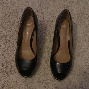 Clark’s. Black Heels with Peep Toe and Glossy Leather Finish